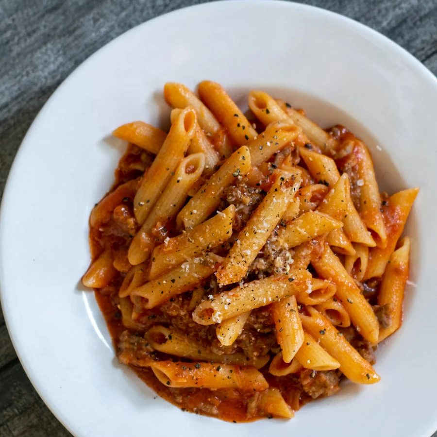 Penne arrabbiata topped with basil